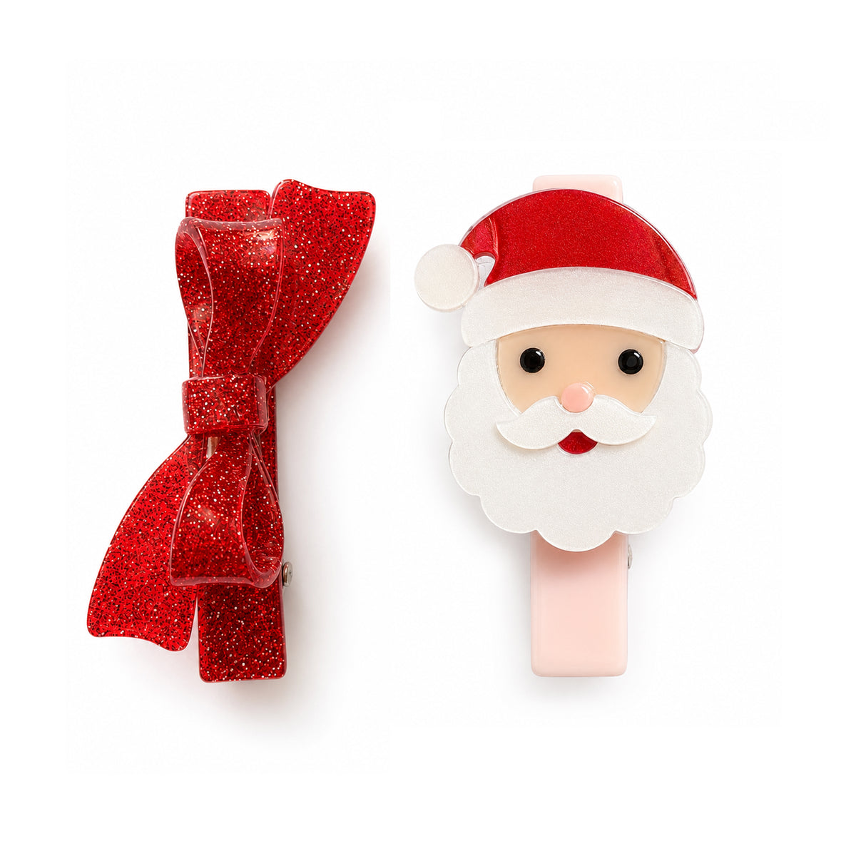 A Christmas-themed hair clip set featuring a red glitter bow and a Santa Claus face hair clip with a pink plastic base, shown on a plain white background.