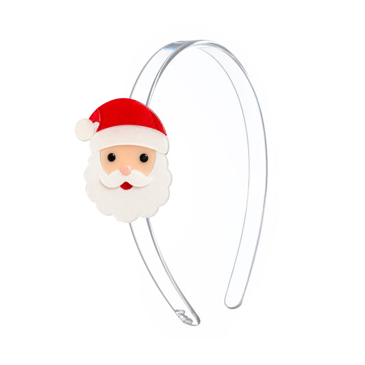 A clear plastic headband featuring a cute, stylized Santa Claus face charm with a red hat, white beard, and small red nose, shown against a plain white background.