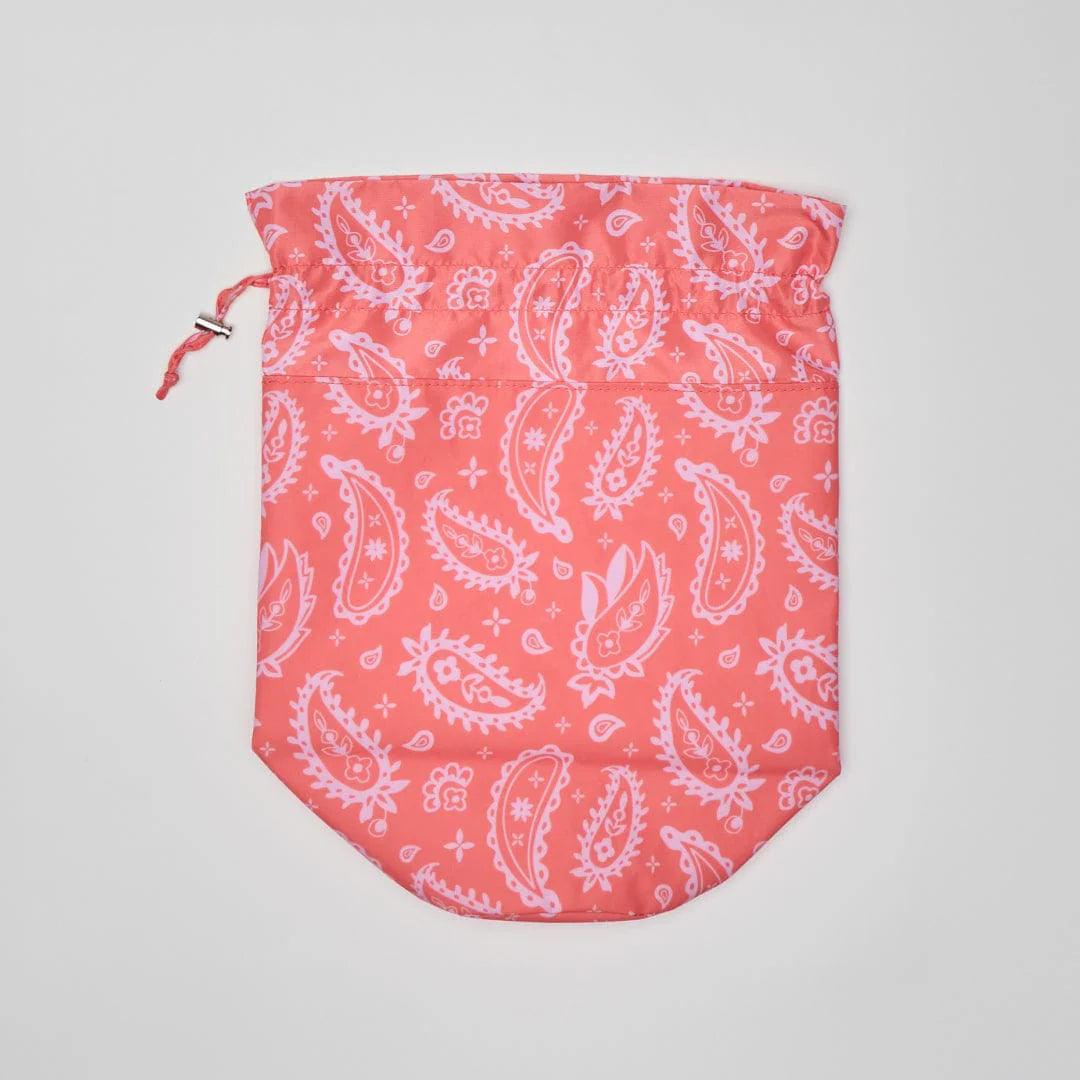 Wet bag with Pink drawstring with white paisley pattern 