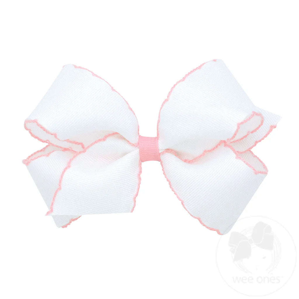 Medium white bow with pink moonstich trim