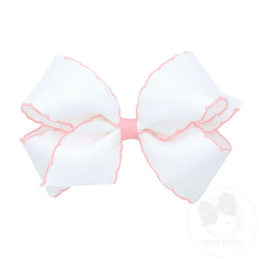 Medium white bow with pink moonstich trim