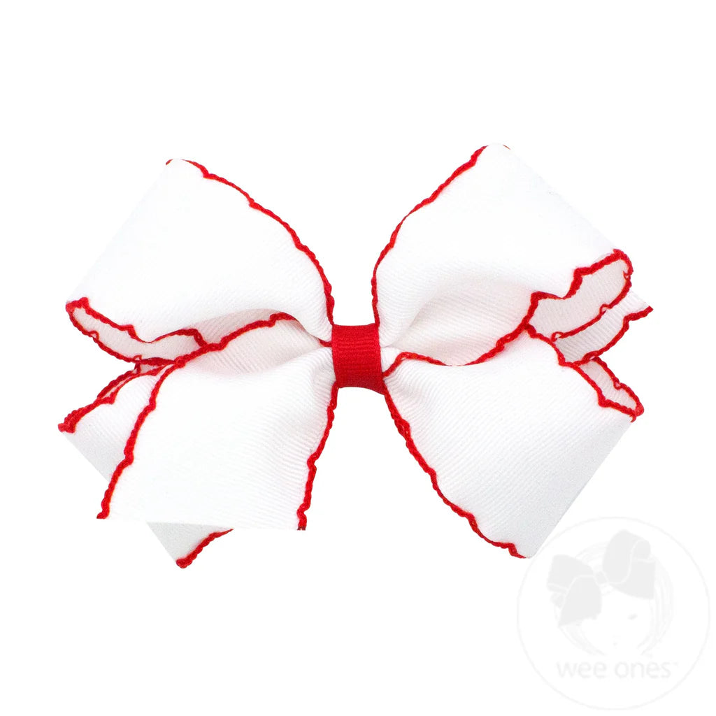 Medium white bow with red moonstitch
