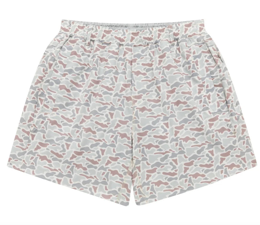 Shorts with a tan and green camo print.