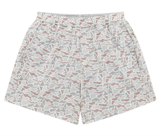 Shorts with a tan and green camo print.