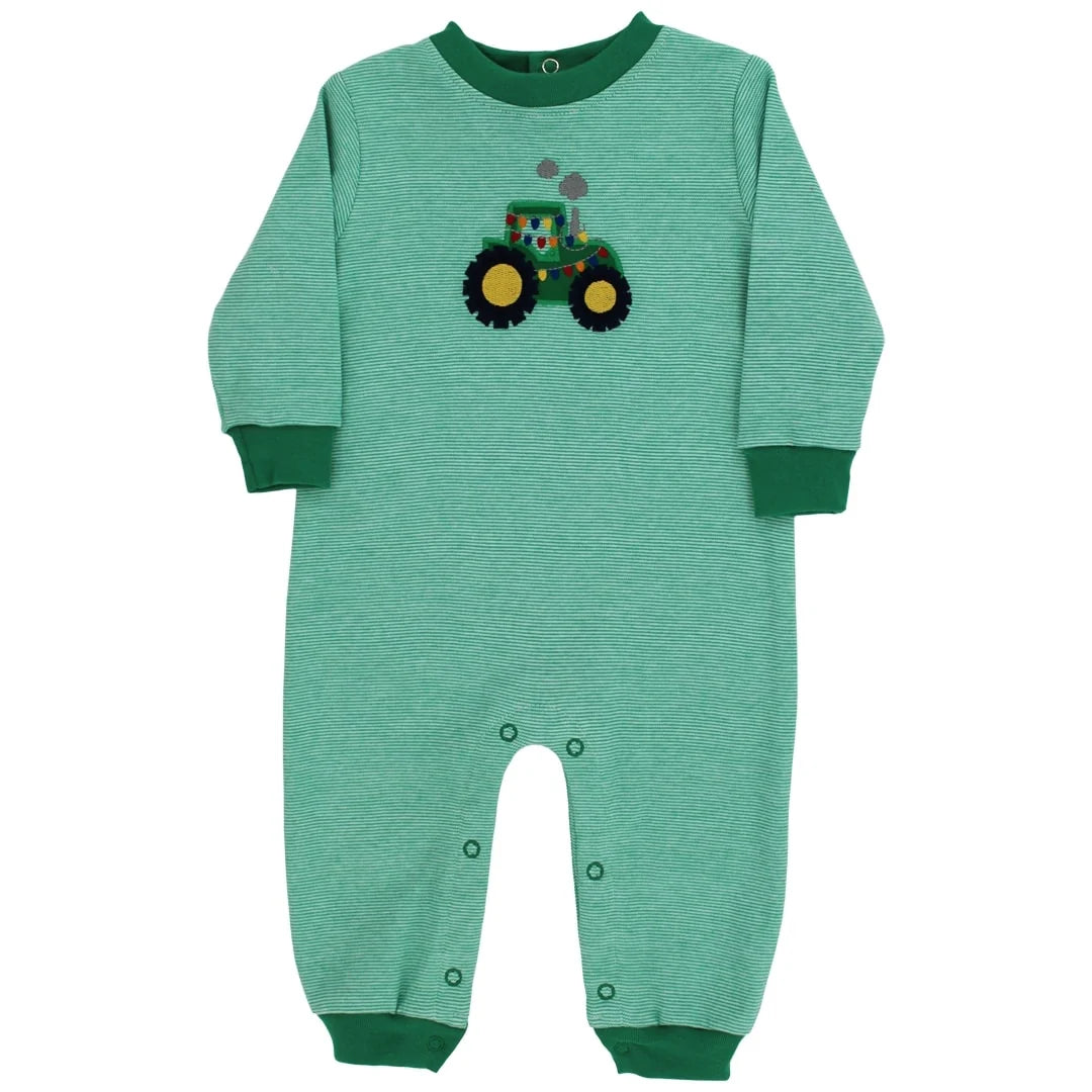 Green baby onesie with a tractor christmas design on a white background