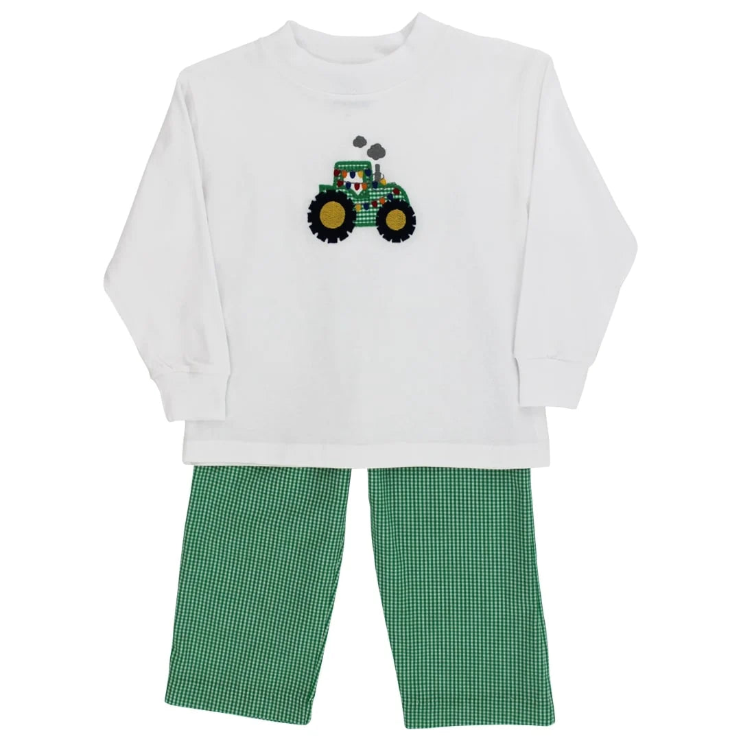 A toddler's two-piece pant set featuring a white long-sleeve shirt with a green tractor applique on the chest, paired with green and white gingham pants.