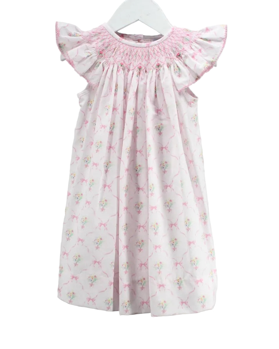 Pink floral smocked dress with ruffled sleeves.