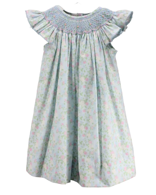 Children's smocked dress with floral pattern with ruffle sleeves.
